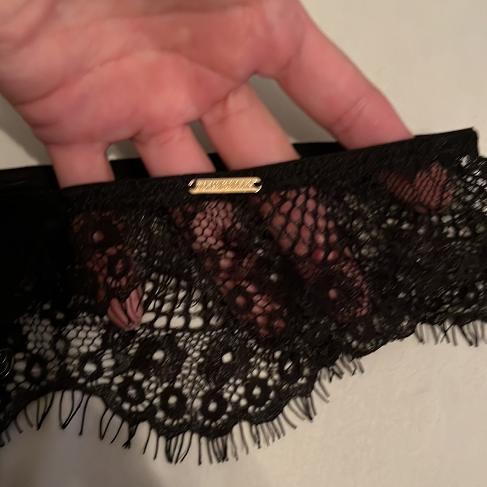 Mostly black lace, sheer coverage to front area. Thin thong area. - Picture 3 of 8
